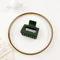 Detail of a dark green matte square hair claw clip placed on a decorative white tray - Army Green