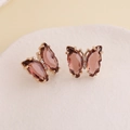 Detailed macro view of butterfly earrings with amber pink resin and gold alloy edges - Dark Coffee (4#)