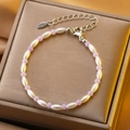 Elegant beaded bracelet with pearls and purple beads on a stainless steel chain - Stainless Steel Purple White Rice Bead Bracelet (10849)