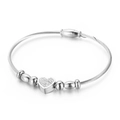 Silver cable wire bracelet with heart charm and inlaid cubic zirconia stones on white back - Silver (KB146938-BMW)