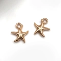 Golden starfish charms for DIY jewelry making with realistic texture on white background - Ocean Starfish / 13x15.5mm / KC Gold