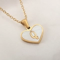 Golden heart necklace with white shell inlay featuring a 3D metallic letter Q - Letter Q