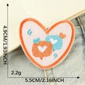 Pink heart embroidery patch with blue heart detail and size specs 4.9cm by 5.5cm - Orange Blue Small Heart (B1L-C-1-6)