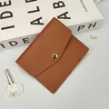 Minimalist light brown faux leather card holder with litchi texture and metal buckle - Light Brown