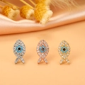Detailed macro view of seahorse-shaped stud earrings in silver, gold, and rose gold finishes - 10# Fish