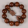 Macro shot of 13 large dark brown sandalwood beads showing fine cat-eye wood grain - Square Tag + Accessories / 20mm*12 Beads