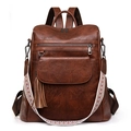 Vintage brown PU leather backpack with tassel detail and colorful woven strap - Dark Brown