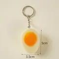 Realistic PVC soft-boiled egg keychain with silver metal ring and 5cm pendant - Half Soft-boiled Egg - Silver Ring