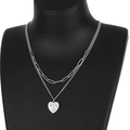 Double-layered silver titanium heart necklace with spinning yes no pendant on a black bust - Steel Color