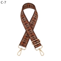 Close-up of ethnic style woven strap with geometric patterns and gold metal hardware - C-7 Coffee Brown