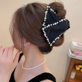 Detailed view of matte black fabric bow hair claw with pearl trim on a model - Black Large Pearl Trim Bow Hair Claw (29#)