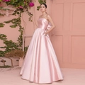 Pink strapless satin floor-length evening gown featuring a large decorative back bow - US Size 2 (S) / Pink