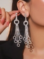 Elegant long silver tassel snake earrings with shimmering rhinestones on a female model - Silver Aligned Rhinestone (DTE1916085S)
