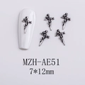 Detailed silver sword and rose metal nail charms on white acrylic nail surface - AE51-Sword Rose