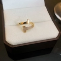 Detail view of 18K gold plated bow open ring with cubic zirconia in a jewelry box - Double T Zirconia Opening Ring (10#)