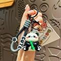 Süßer UV-beschichteter Panda-Schlüsselanhänger mit schwarzem Stern-Armbandanhänger - Panda mit Bambus