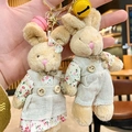 Plush beige bunny pendants in floral overalls with wooden buttons and colorful bells - Rabbit (Girl)