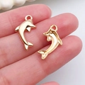 Golden dolphin charm for handmade DIY jewelry, set of 2 metal alloy pendants - 1Pc Dolphin 11x20mm