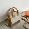 Sac bandoulière artisanal en paille beige avec broderie marguerite et détails dorés - Kaki