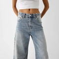 Detail of high-waisted light blue wide-leg denim jeans showing waist and hip tailoring - S / Light Blue