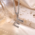 Artistic silver letter E necklace with textured lava finish on a minimalist chain - Steel Letter E (Pendant Only)