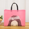 Pink non-woven shopping bag with cute girl illustration and black sturdy handles - Girl Portrait