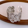 Detailed view of silver镂空carved hollow pattern on a vintage style open cuff bracelet - Silver Retro Hollow Flower