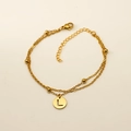 Bracelet double rang en acier doré avec pendentif rond évidé arborant la lettre L - Lettre L (S-H202-L)