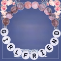 Detail of pink zebra stone bead bracelet with GIRLFRIEND letter beads on a gift card - To My Girlfriend
