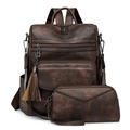 Detailansicht eines braunen Vintage-Lederrucksacks mit modischem Quastenanhänger und Textur - Zweifarbig Kaffee Grobkorn