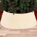 Close-up of cream knitted Christmas tree skirt with classic cable stitch patterns - Knitted Cream / Small 40x60x20cm