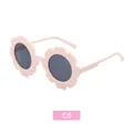 Pink sunflower petal shaped sunglasses for kids with round dark grey lenses - Orange Pink