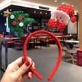 Close-up of Christmas headband with plush red band, sequin tree and cute snowman motif - Snowman and Tree