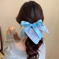 Light blue satin hair scrunchie with stripes and floral embroidery on a low ponytail - Light Blue Embroidered Floral Stripe (21#)