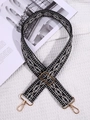 Ethnic geometric weave bag strap with black, white, and brown diamond patterns - Black