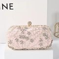 Pink satin evening clutch bag featuring handmade pearls and sparkling rhinestones - Pink