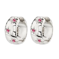 Macro detail of silver hoop earrings with engraved stars and red zircon stones - Silver-Red Zirconia