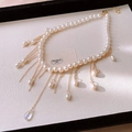 Collana di perle retrò francese con nappe dorate e ciondolo a goccia d'acqua gioielli - Bianco