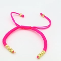 Detail of adjustable pink braided rope bracelet with polished gold beads and sliding knot - Plum Red