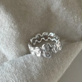 Irregular textured silver ring with molten metal design on a beige woven surface - Irregular Molten Texture Ring (J2657)