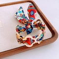 Golden clover bangle with colorful bohemian ribbon tied in a bow for women - Gold Multicolor Bohemi Silk Scarf Bangle