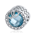 Silver charm with light blue crystal and heart details on a reflective white background - Light Blue Heart Decorated Honeycomb Hollow Style (31) / Normal Specification / Silver