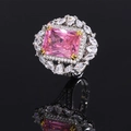 Elegant fashion ring featuring a pink rectangular gemstone with diamond accents and a silver finish - Pink Zircon