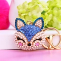 Sparkling fox head keychain with blue crystals and white pearls on golden metal ring - Rhinestone Fox Head Royal Blue