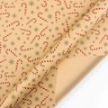 Vintage Christmas kraft wrapping paper featuring candy canes and snowflake patterns - Style 4