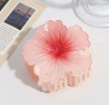 Macro view of a matte gradient pink plumeria hair claw clip with detailed resin texture - Plumeria Claw Clip Korean Pink