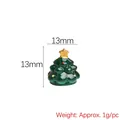 Close-up of a 13mm miniature resin Christmas tree with colorful dots and a gold star - Christmas Tree Figurine