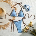 Detailed flat lay of blue rib-knit bikini with brown contrast straps and tulip decor - Sky Blue
