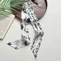 Green silk hair ribbon with ink calligraphy, bamboo prints and elegant tassel - Literary Elegance