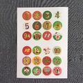 Set of 24 Christmas advent countdown stickers with red and green festive patterns - Christmas Numbers